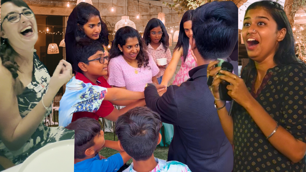 A professional wedding magician in Chennai performing an interactive magic trick for a bride and groom during their wedding reception. The magician, dressed in a stylish blazer, is astonishing the crowd with a blend of close-up illusions and mind-reading effects. The background features joyful wedding guests of all ages laughing and applauding. This vibrant and colorful image captures the essence of modern wedding entertainment in Chennai — fun, unforgettable, and unique.
